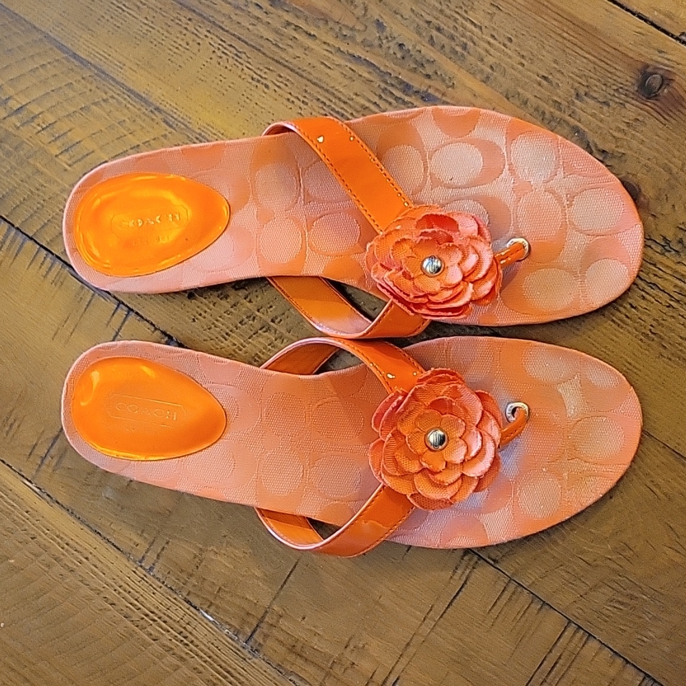 Orange Coach flip flops